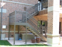 iron-anvil-stairs-double-stringer-treads-concrete-diamond-pattern-gustaferson-1