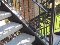 iron-anvil-stairs-double-stringer-treads-concrete-diamond-pattern-gustaferson-5