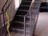 iron-anvil-stairs-double-stringer-treads-concrete-fill-njm-office-1