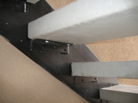 iron-anvil-stairs-double-stringer-treads-concrete-smooth-2