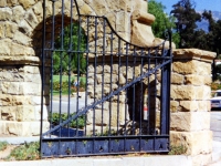 iron-anvil-gates-by-others-driveway-french-iron-entrance