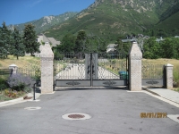 iron-anvil-gates-by-others-driveway-scroll-above-pepperwood-subdivision