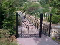iron-anvil-gates-by-others-man-arch-like-kilgore
