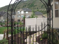 iron-anvil-gates-by-others-man-concave-with-arbors