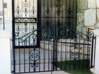 iron-anvil-gates-by-others-man-double-scroll