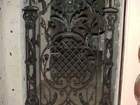 iron-anvil-gates-by-others-man-scroll-wine-cellar