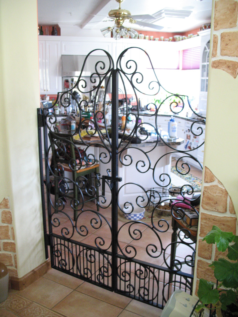 iron-anvil-gates-man-french-curve-scroll-top-aire-dr-park-city-1-1