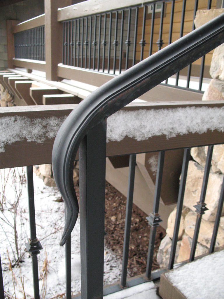 iron-anvil-handrails-post-mount-termination-moulded-cap-snake-tongue-ross-handrail-glenwild