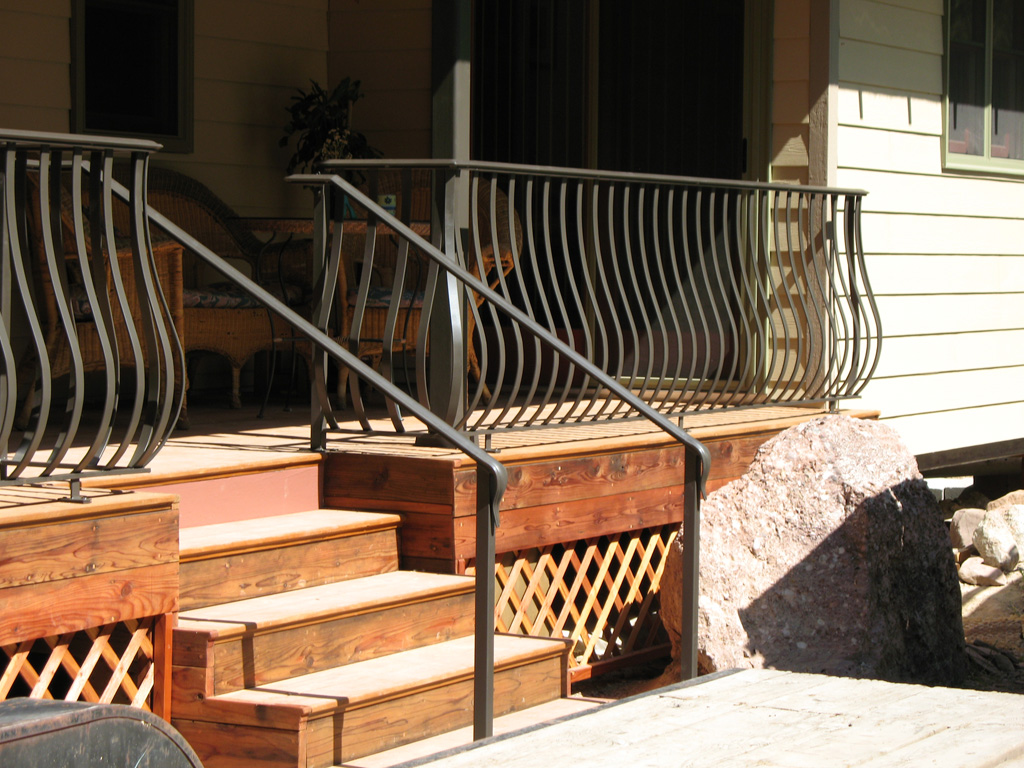 iron-anvil-railing-belly-rail-single-top-flat-bar-byrne-immigration-canyon-3