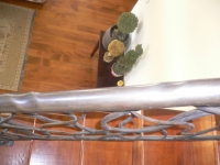 iron-anvil-railing-by-others-carmel-jensen-hand-rail-round-distressed-pipe