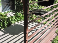 iron-anvil-railing-horizontal-flat-bar-allen-millo-strip-rail-urban-dev-by-others-2