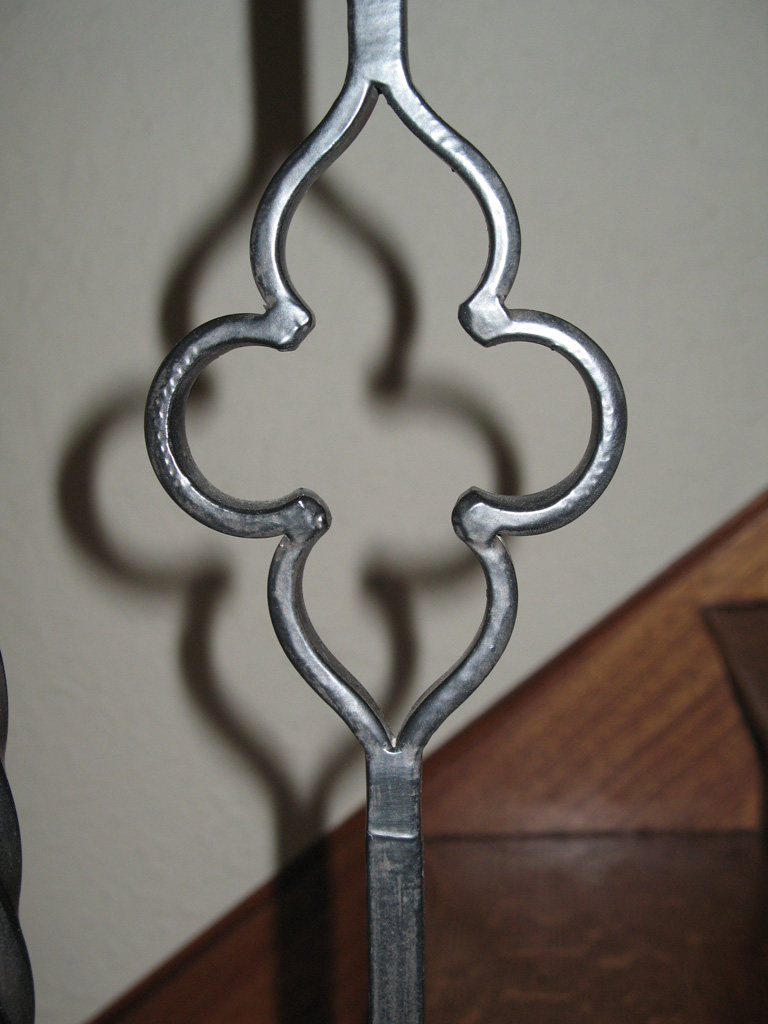 iron-anvil-railing-scrolls-and-patterns-picket-castings-twist-steel-pattern-julie-lapine-harvard-5