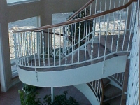 41-0050-iron-anvil-stairs-grand-circular-treads-angle-iron-wood-treads-jensen-wally-stair-saratoga-springs-3