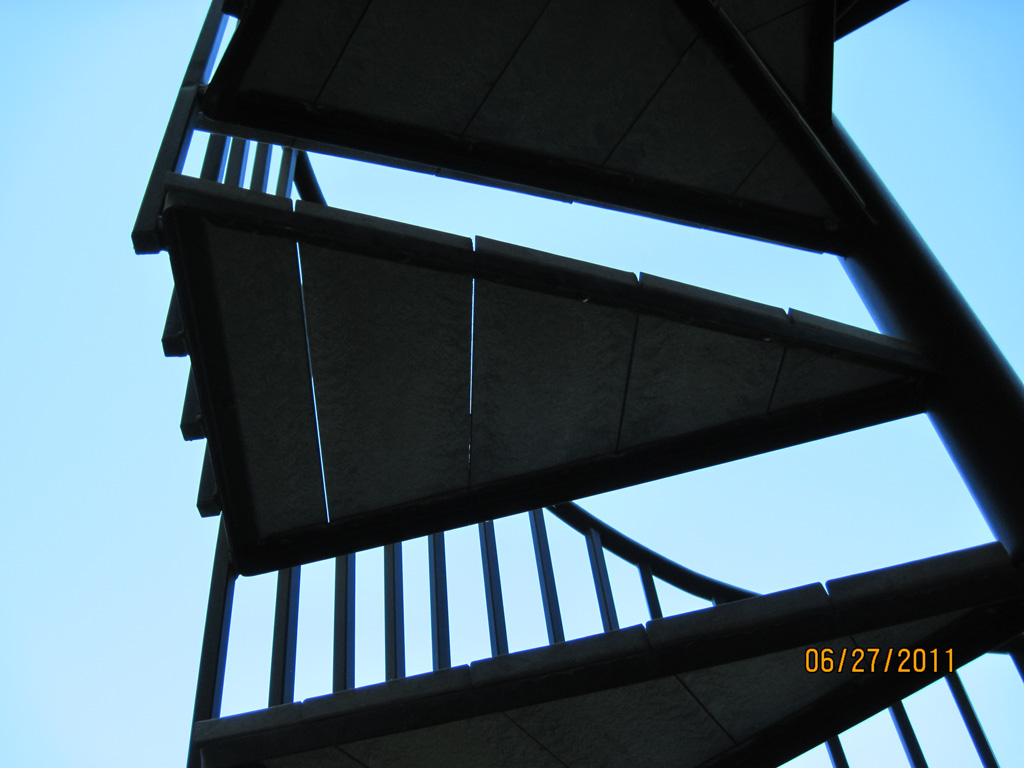iron-anvil-stairs-spiral-wood-trex-wood-fix-it-wright-10