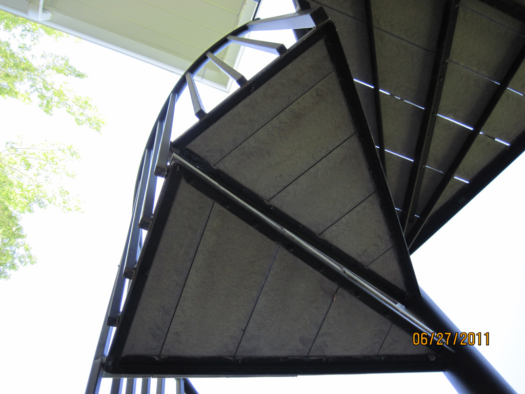 iron-anvil-stairs-spiral-wood-trex-wood-fix-it-wright-11
