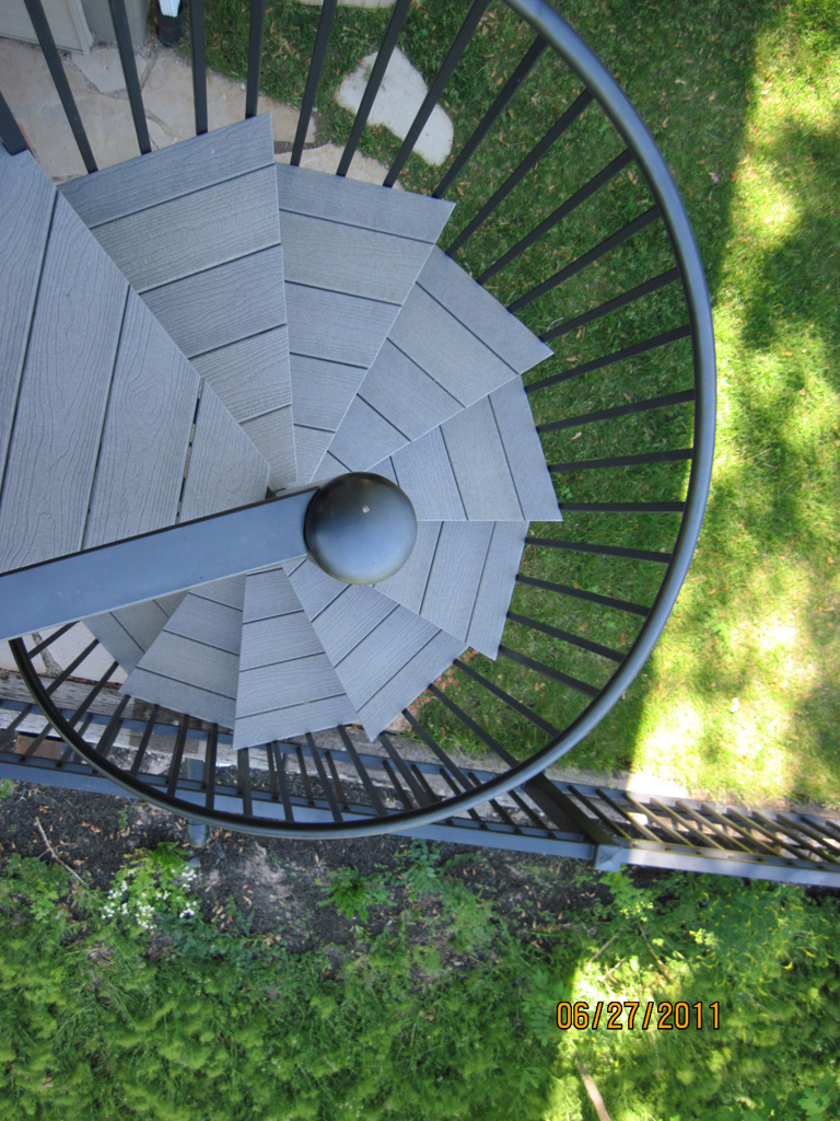 iron-anvil-stairs-spiral-wood-trex-wood-fix-it-wright-12