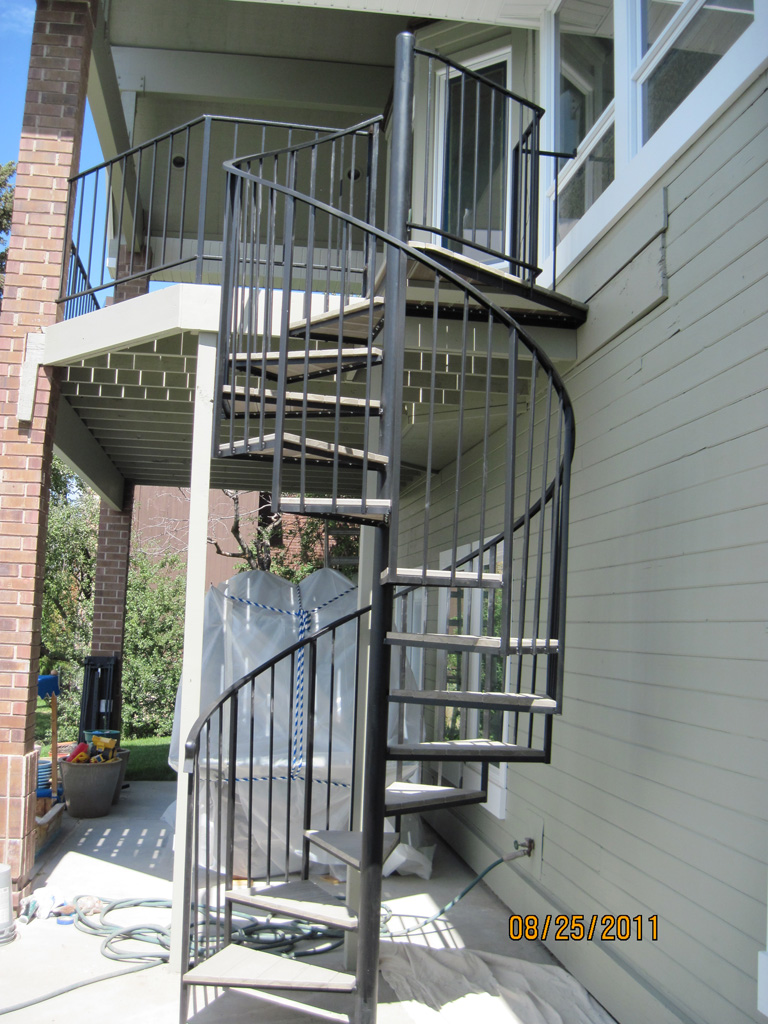 iron-anvil-stairs-spiral-wood-trex-wood-fix-it-wright-6