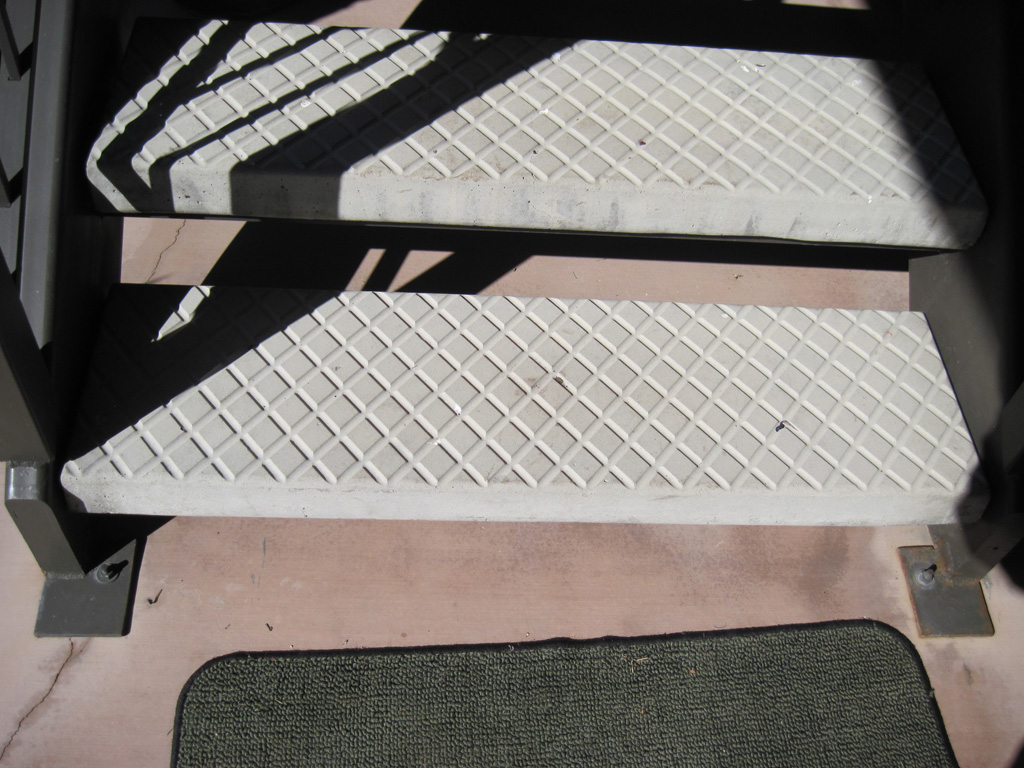 iron-anvil-stairs-double-stringer-treads-concrete-diamond-pattern-gustaferson-10