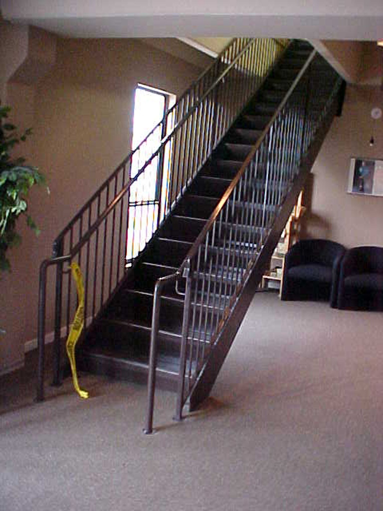 iron-anvil-stairs-double-stringer-treads-concrete-fill-njm-office-2