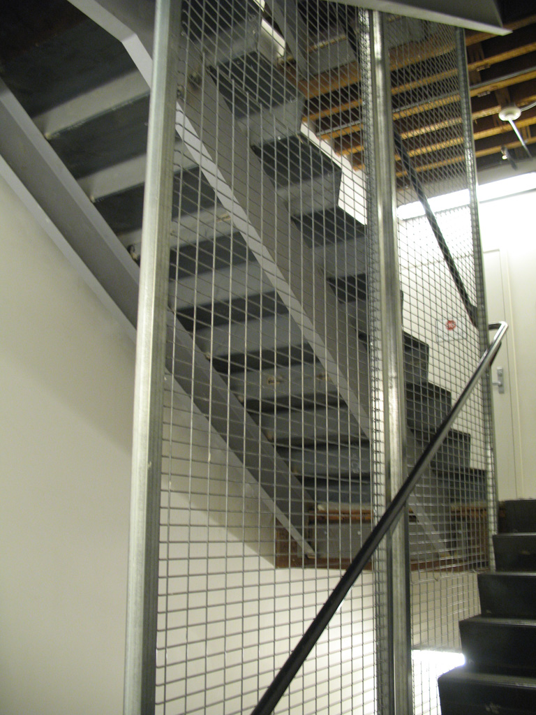 iron-anvil-stairs-double-stringer-treads-smooth-dmc-salt-lake-hardware-2