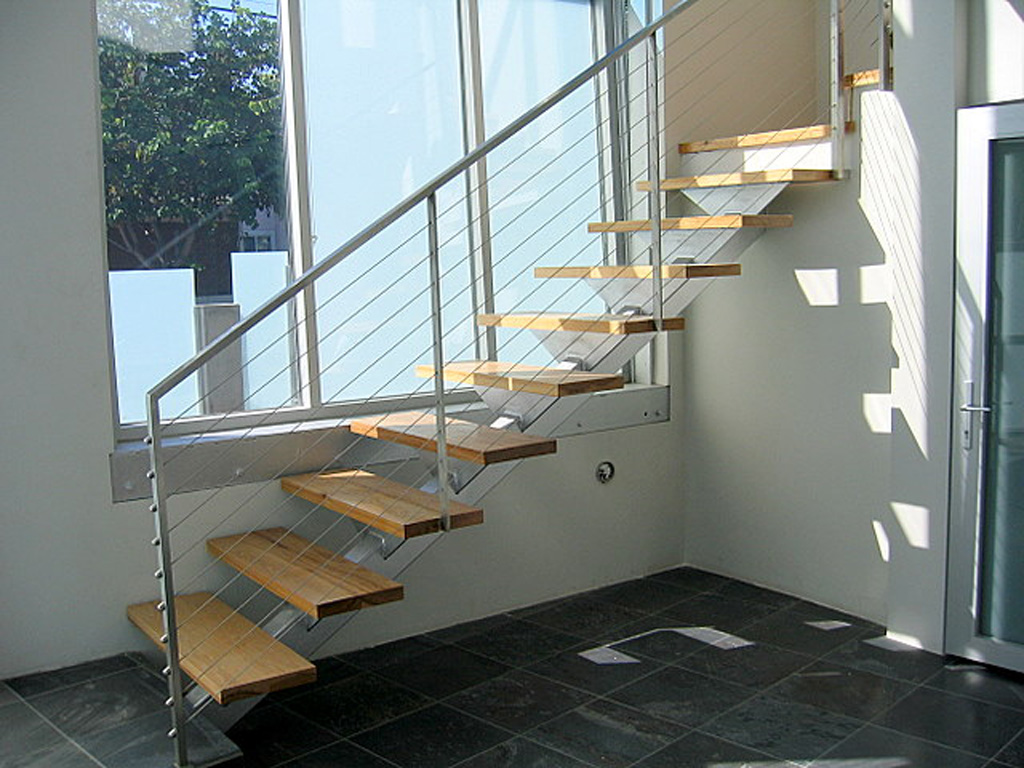 iron-anvil-stairs-single-stringer-treads-wood-by-others-2
